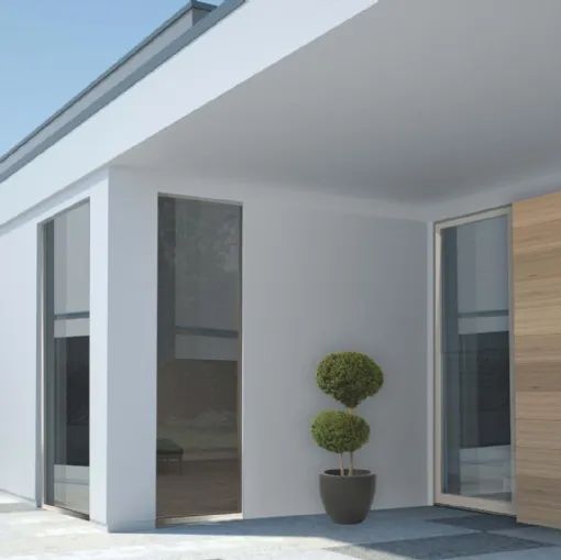 Finestra ad anta ascorrevole caratterizzata da profili minimali in legno di rovere con carter esterno in alluminio Hidden Wide Glass di De Carlo